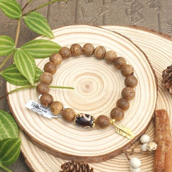 Vòng trầm hương Lào 10 li mix charm vàng
