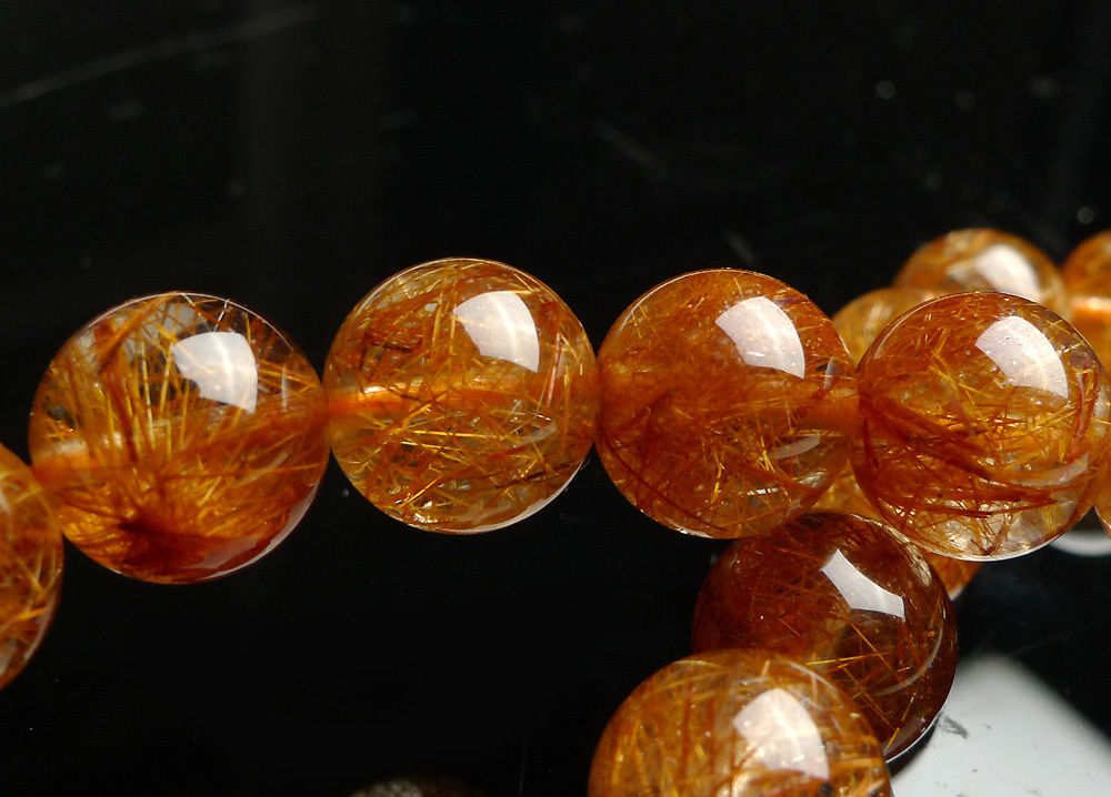 Vòng trầm hương từ thiên nhiên - Ngọc Trầm Hương thạch anh tóc đỏ